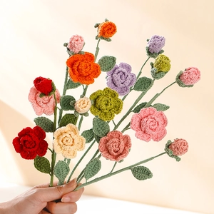 Handcrafted crochet rose bouquet with colorful knitted flowers for home decoration