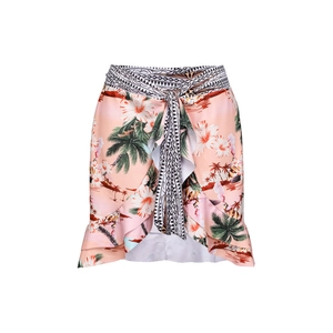 Detail of pink tropical hibiscus print sarong wrap skirt with geometric waist tie