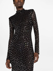 Detailed close-up of a slim-fit black dress featuring shimmering silver sequins and high neck