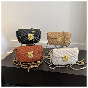 Detailed view of four quilted crossbody bags in black, khaki, brown, and white with gold locks