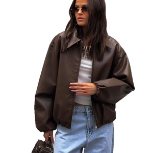 Women's dark brown faux leather bomber jacket with zipper and elastic hem on white background