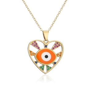 Detailed close-up of a gold heart pendant with multi-color zircon evil eye and vibrant gems