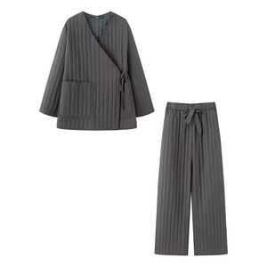 Women's dark gray quilted loungewear set featuring tie-front top and matching pants