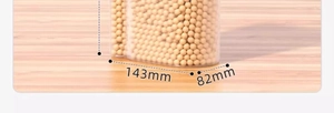 Macro shot showing bottom dimensions of 143mm by 82mm on a clear grain storage container