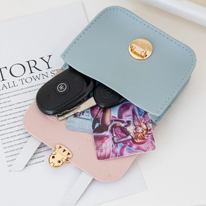 Mini light blue leather coin purse with gold rotating lock and car key storage