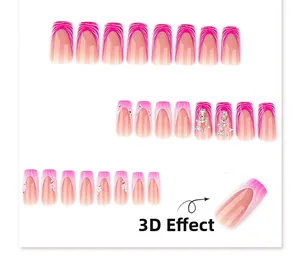 Detail of pink zebra print press-on nails with 3D stars and floral charms in long square shape
