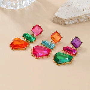 Three pairs of geometric colorful gemstone drop earrings with golden metal frames
