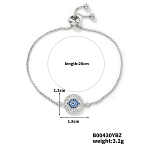 Silver evil eye bracelet with blue rhinestones detailing size 1.8cm by 1.2cm and 26cm length
