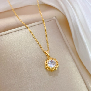 Elegant gold flower pendant necklace featuring a central sparkling zircon with an O-chain
