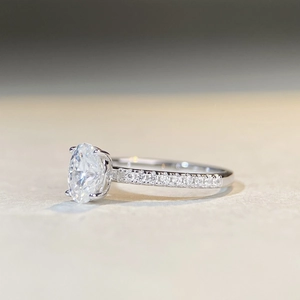 Oval cut moissanite solitaire ring in S925 sterling silver with pavé band detail