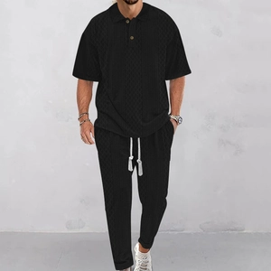 Men's black knit set featuring waffle texture polo shirt and drawstring trousers