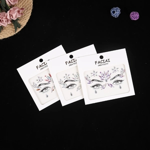 Three packs of acrylic crystal face jewels and rhinestone stickers for eye makeup on black background