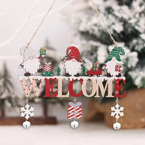 Detail of wooden Christmas Welcome sign with gnomes, snowflakes and festive metal bells