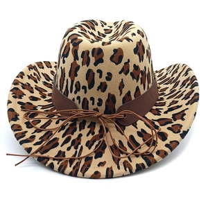 Detail of leopard print cowboy hat featuring a brown leather band and intricate rope knot