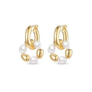 Golden hoop earrings featuring baroque freshwater pearls and irregular gold beads on white