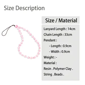 Pink star and heart beaded phone charm made of resin and polymer clay with strap