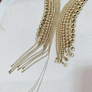 Detail of 18K gold-plated stainless steel bead chains with lobster clasps and extenders