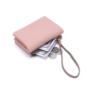 Pink pebbled leather foldable short wallet with wristlet strap and zipper pocket