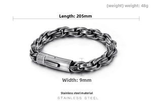 Macro detail of men's vintage stainless steel woven chain bracelet with size measurements