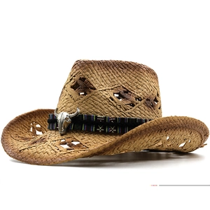Vintage woven straw western cowboy hat with wide brim and bull head metal ornament