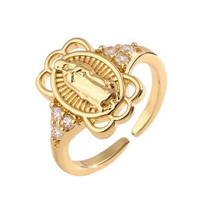 Adjustable golden religious emblem ring with side zircon accents on white background