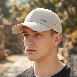 Breathable beige men's sports baseball cap with laser-cut holes and metal sports logo