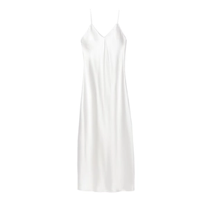 Detail of white satin slip dress showing elegant V-neckline and delicate spaghetti straps