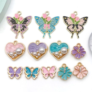 Detailed selection of colorful enamel butterfly and heart alloy charms for DIY jewelry making