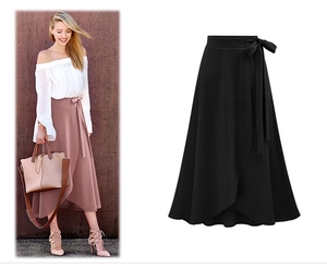 Detail of high waist wrap midi skirt featuring adjustable waist tie and bow design