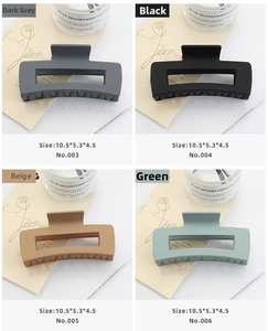 Four large matte rectangular hair claws in grey, black, yellow, and green, 10.5cm size