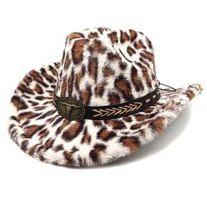 Close-up of leopard print plush cowboy hat with bronze bull head metal buckle detail