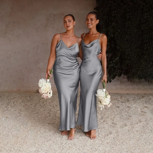 Detailed close-up of silver-grey satin maxi dress with deep V-neck and thin straps