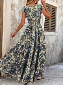 Rear view of vintage damask floral maxi dress with ginger base and elastic waist detail