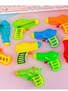 Colorful mini plastic water guns for children featuring a variety of vibrant translucent colors