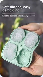 Detail of owl shaped silicone ice mold in light green showing soft flexible material