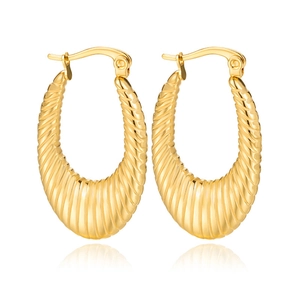 Pair of gold geometric U-shaped hoop earrings with textured stripe croissant pattern