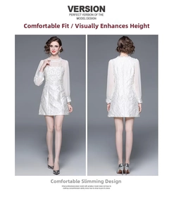 Close-up of white lace embroidery and sheer chiffon sleeves on a vintage dress
