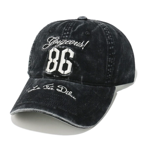 Vintage washed charcoal baseball cap featuring white 86 and Gorgeous embroidery