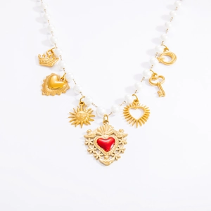Retro pearl necklace with gold heart pendants and red enamel sacred heart centerpiece