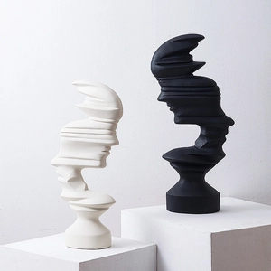 Abstract modern human face sculpture set in matte black and white for home decor