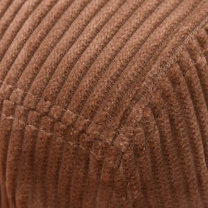 Close-up of brown corduroy fabric texture and stitching on the vintage baseball cap