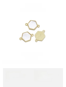 Detail of 18K gold-plated hexagonal shell charms with 18x12mm dimensions and 1.4g weight