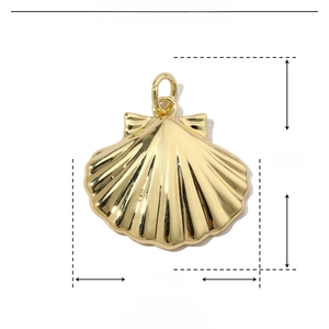 Detailed view of gold scallop shell charm with dimensions 22mm by 19mm in copper