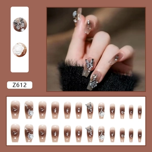 Dark brown gradient almond press-on nails with 3D metal butterfly and white rose charms