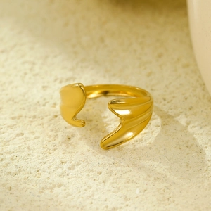 Detail of 18K gold-plated open ring featuring a minimalist hollow wavy design