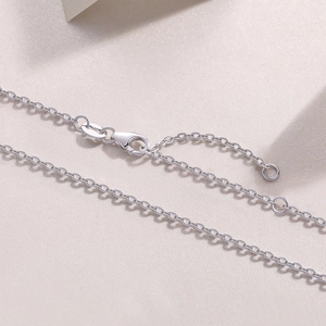 Detailed macro view of S925 sterling silver chain with lobster clasp and hallmark
