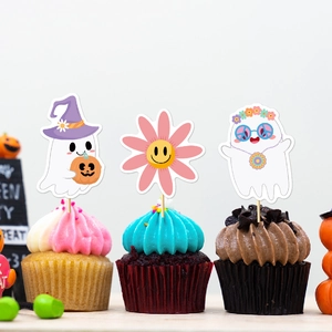 Detail of boho Halloween cupcake toppers featuring hippie ghosts and smiley flowers