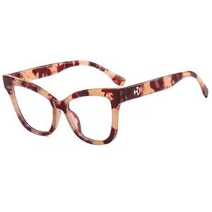Cat eye TR90 anti-blue light glasses with vintage amber tortoiseshell frame and metal HD logo