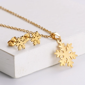 Goldenes Schneeflocken-Set mit Halskette und Ohrringen aus Edelstahl als Weihnachtsgeschenk