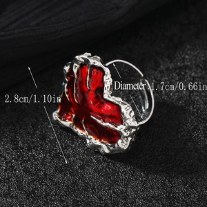 Minimalist red heart liquid metal ring with silver edges and artistic irregular design